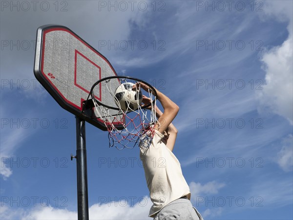 Basketball Jump with the ball to the basket and net