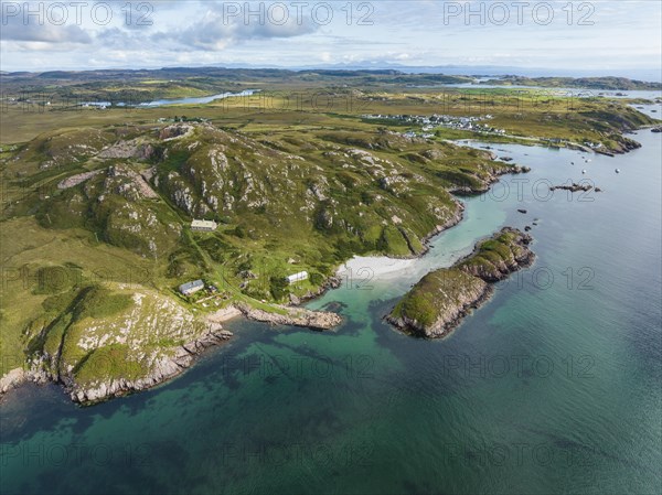 Aerial view of the Ross of Mull peninsula and the fishing village of Fionnphort in the picture on the right