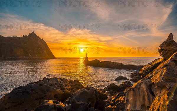 The Lighthouse at the beautiful sunset of the town of Pasajes San Juan. Gipuzkoa