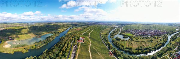 The Mainschleife near Volkach winds through the valley and is surrounded by fields and vineyards. Volkach