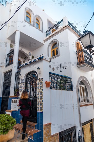 A young woman in the white houses of Mojacar