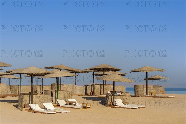 Parasol and sun loungers