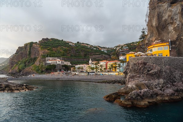 View of Ponta do Sol beach in summer from the seafront called Cais da