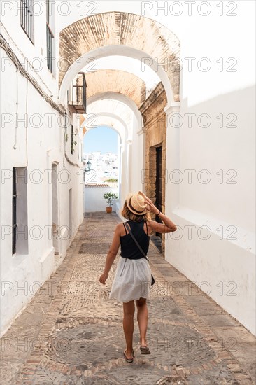 A young tourist visiting the historic center of Vejer de la Frontera
