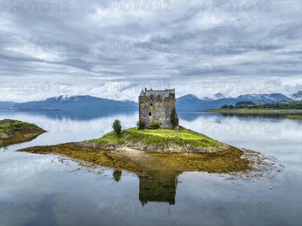 Aerial view of the 14th century island castle Castle Stalker in Loch Laich