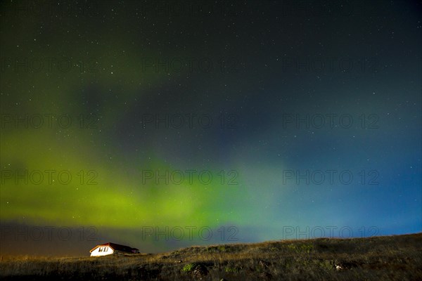 Green lights of the beautiful Northern Lights on the Reykjanes peninsula in southern Iceland