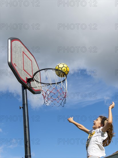 Basketball Jump with the ball to the basket and net