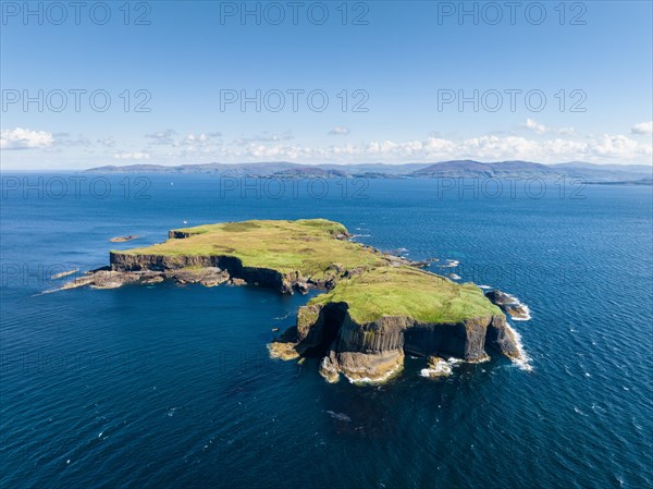 Aerial view of the uninhabited rocky island of Staffa with the prominent basalt columns and Fingal's Cave