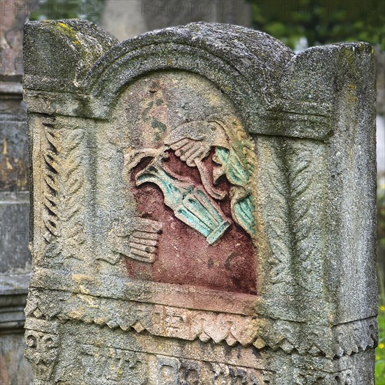 Jewish gravestone with coloured relief of a Levite jug