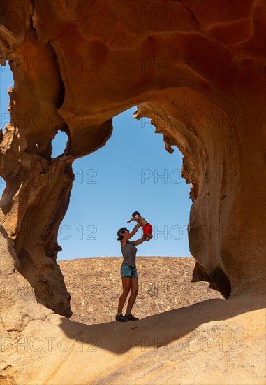 A mother having fun with her baby at the Mirador de la Penitas in the Penitas Canyon