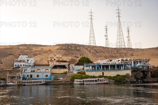 Sunset over the sand mountains in a Nubian town along the Nile river and near the city Aswan. Egypt