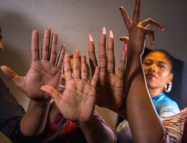 The beautiful black ethnic skins of some friends shaking hands