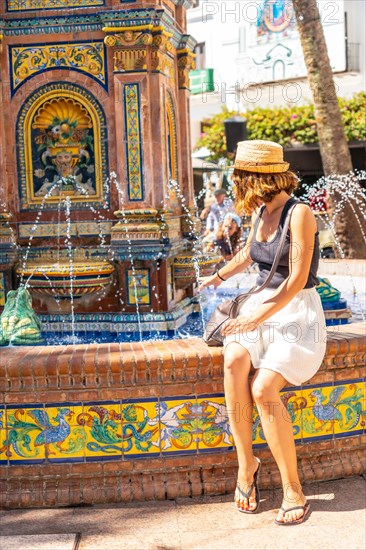 Water fountain and the town hall in the plaza de espana in Vejer de la Frontera