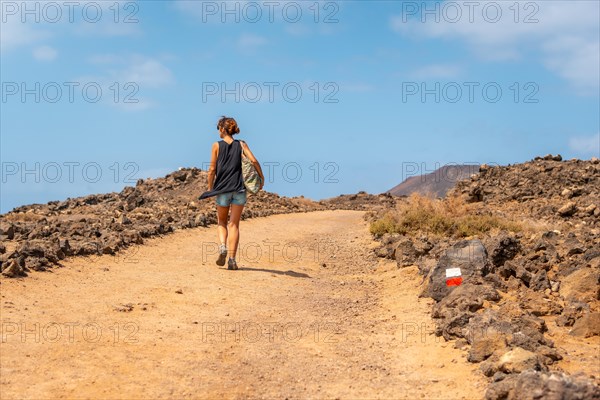 A young woman visiting the Isla de Lobos