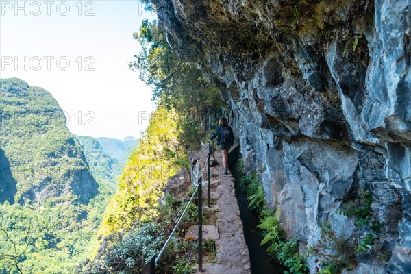 Trekking trail on the cliffs at Levada do Caldeirao Verde