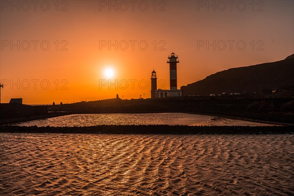 Silhouette of the Fuencaliente Lighthouse at sunset