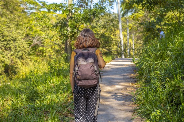 A young woman enjoying the temples of Copan Ruinas. Honduras