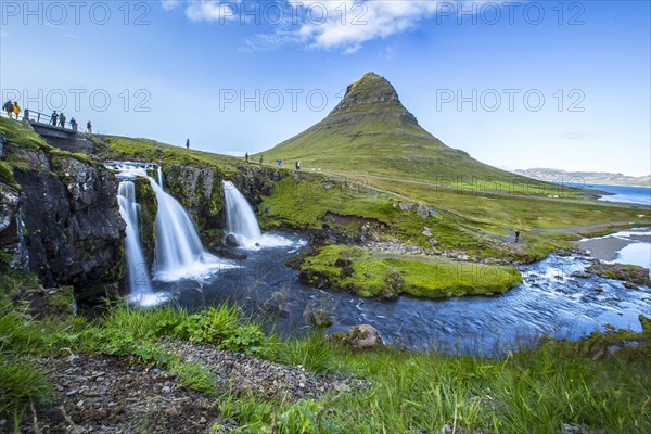 The famous Icelandic mountain Kirkjufell and the small waterfalls