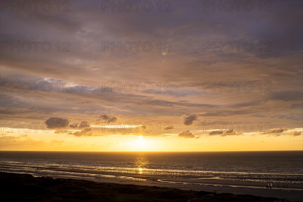 Sunset on the beach of De Panne