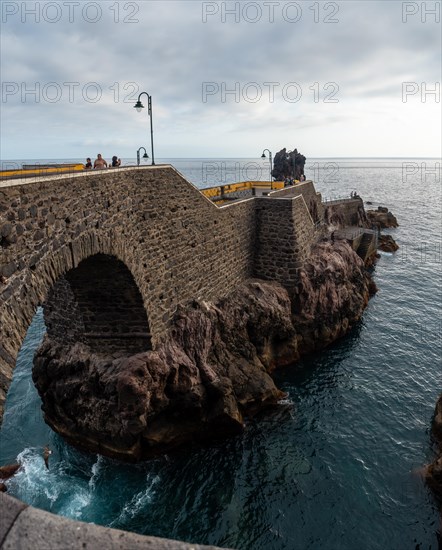 Beautiful coastline of Ponta do Sol in summer and a sea walk called Cais da