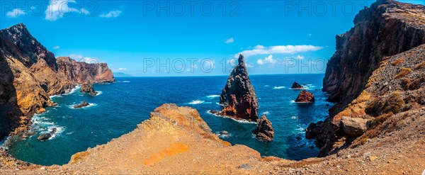 Panoramic view of the colorful rock formations at Ponta de Sao Lourenco