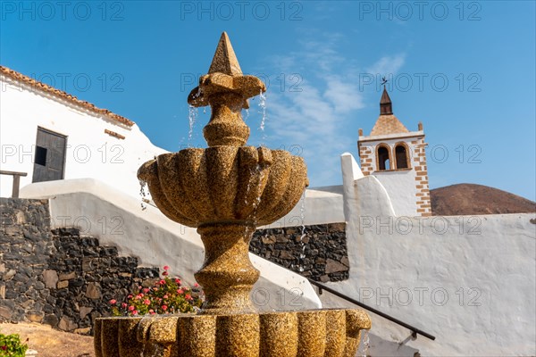Detail of the water in the fountain next to the white church of Betancuria