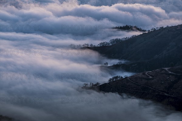 Sea of clouds from the mountain of Penas de Aya a winter morning. Basque Country