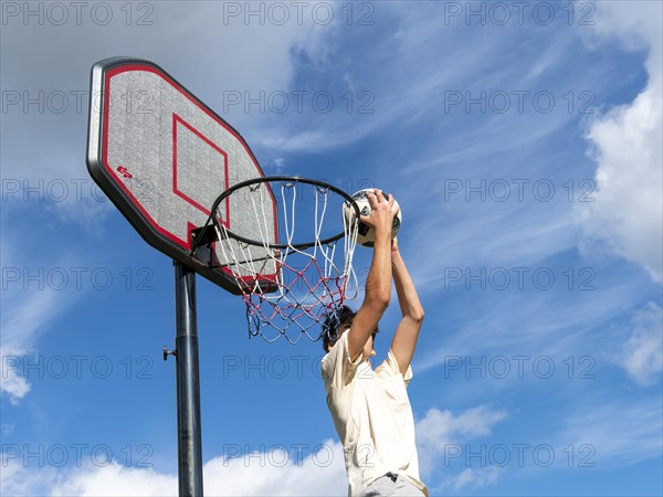 Basketball Jump with the ball to the basket and net