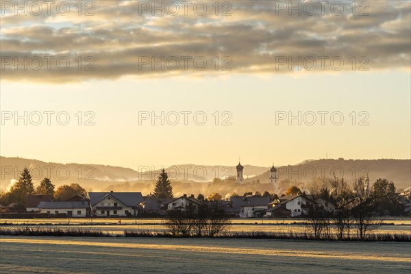 The town of Isny im Allgaeu at sunrise in good weather. Autumn