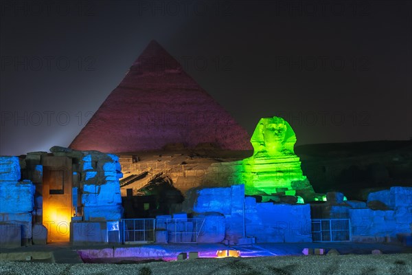 Sound and light show at the beautiful pyramids and sphinx of Giza. Night in the city of Cairo. Africa