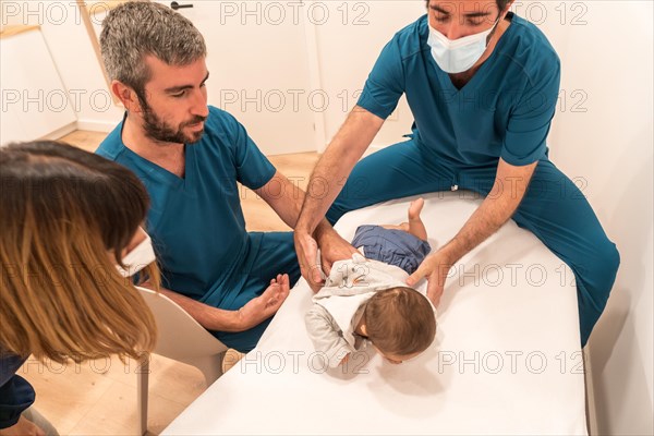 Mother visiting the pediatrician with a newborn baby