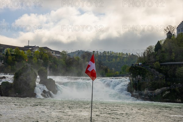 Rhine Falls and Swiss Flag at Neuhausen in Schaffhausen
