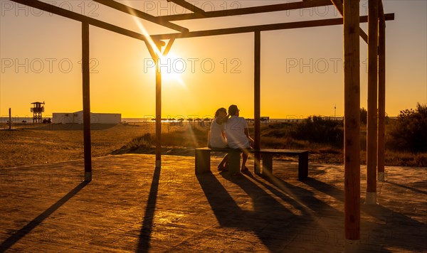 A couple in love on the Bateles beach in Conil de la Frontera