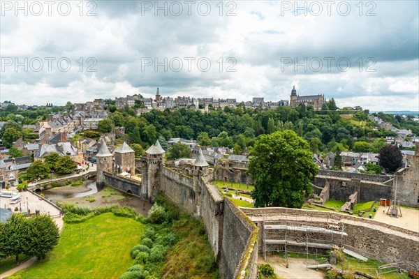 Interior of the castle of Fougeres and the city in the background. Brittany region