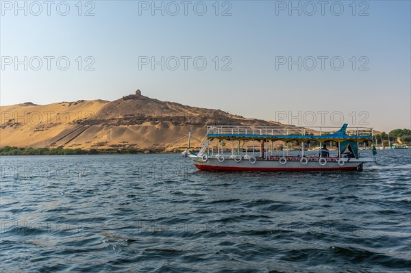 Small towns and ancient temples navigating the Nile River in Aswan city. Egypt