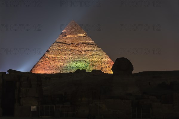 Sound and light show at the beautiful pyramids and sphinx of Giza. Night in the city of Cairo. Africa