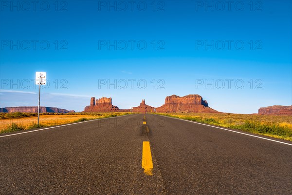 Panoramic of the road with its yellow lines of Monument Valley