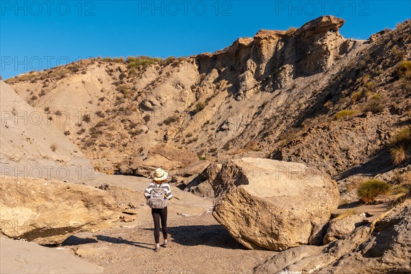 A young hiker in the desert of Tabernas