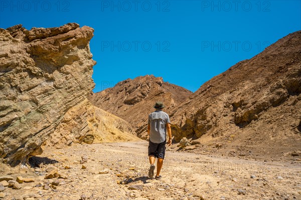 A man starting the Golden Canyon trail