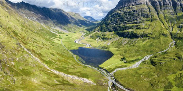Aerial panorama of the western part of Glen Coe with the freshwater loch Loch Achtriochtan and the River Coe flowing into it