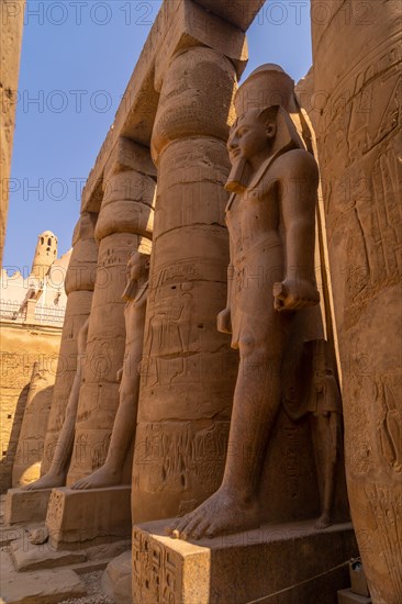 Sculptures of pharaohs in the Egyptian Temple of Luxor and its precious columns. Egypt