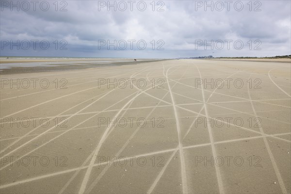 Traces of beach sailors in the sandy beach