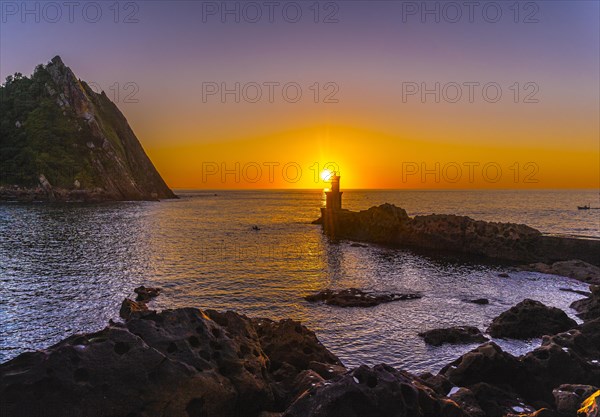 Golden hour at the Lighthouse at sunset in Pasajes San Juan near San Sebastian