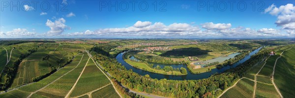 The Mainschleife near Volkach winds through the valley and is surrounded by fields and vineyards. Volkach