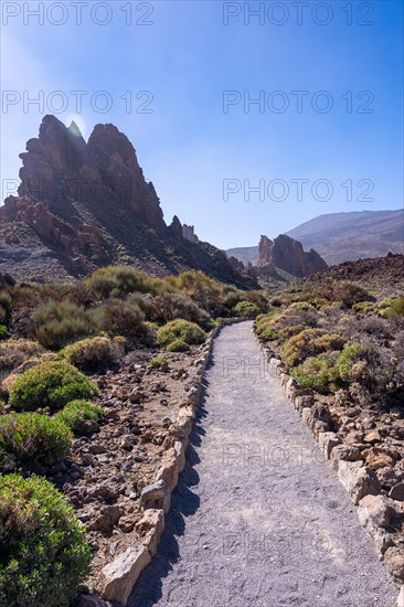 Beautiful path between the Roques de Gracia and the Roque Cinchado in the natural area of Teide in Tenerife