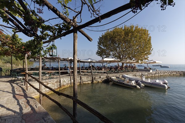 Idyllic harbour and pier on the lakeshore