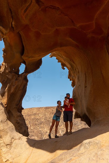 A family and their baby at the Mirador de la Penitas in the canyon of La Penitas