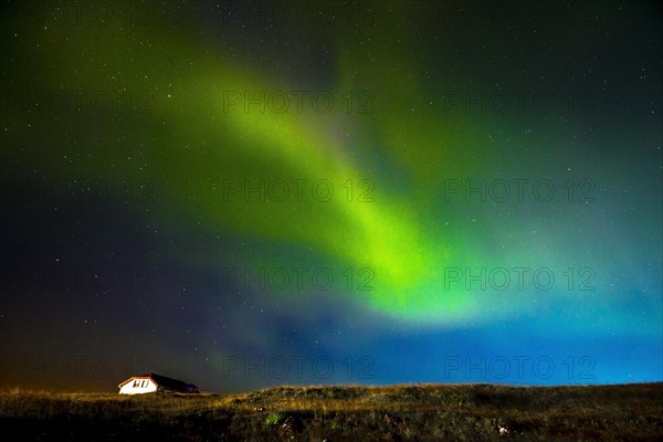 Green lights of the beautiful Northern Lights on the Reykjanes peninsula in southern Iceland