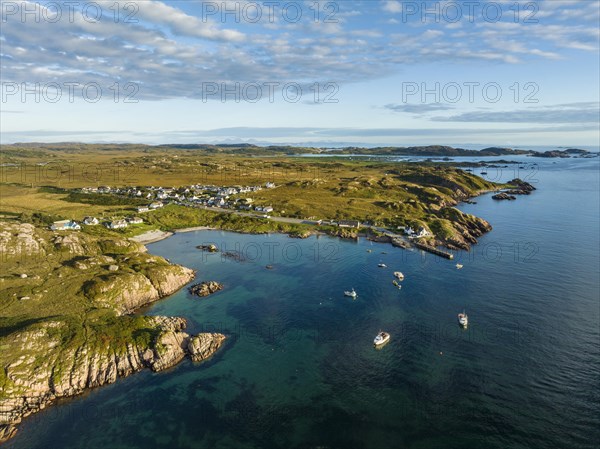 Aerial view of the fishing village of Fionnphort with bathing beach and ferry pier