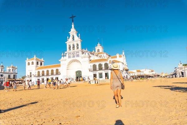 A young tourist visiting the El Rocio sanctuary at the Rocio festival